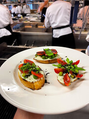 Close up view of a Italian dish in a restaurant kitchen