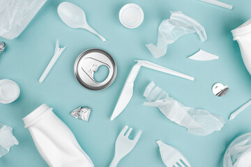 Various recyclable garbage on a blue background