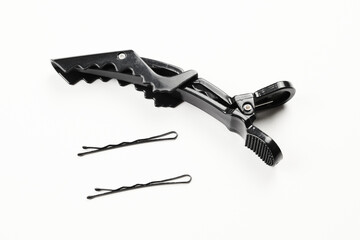 Hairdresser tools close-up isolated on white background. Sets of combs, clips, hairpins, hair beauty salon concept