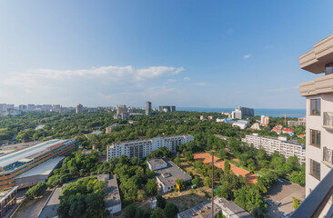 View of a green park, modern buildings, bird's eye view