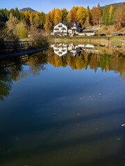 Landscape of the Roana lake in Italy, in autumn - obrazy, fototapety, plakaty