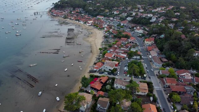 Cap-Ferret, France. Boats seen from an oyster village on the Bay of Arcachon