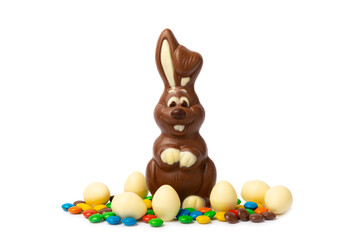 Easter chocolate bunny isolated on a white background. Chocolate eggs and other sweets. Easter celebration concept. Easter sweets on the table. Place for text. copy space.