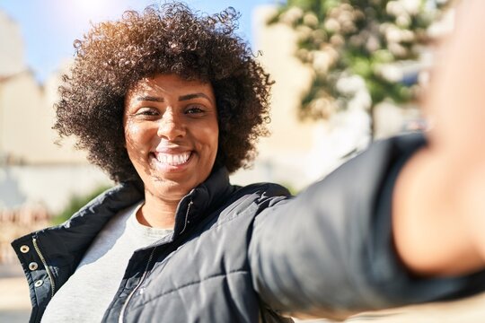 African american woman smiling confident making selfie by camera at park