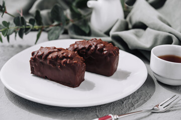 Cookies with chocolate and nuts and tea