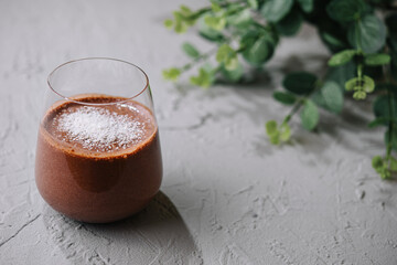 chocolate smoothie with coconut flakes