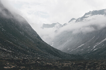 landscape in the mountains on a stormy and cloudy day