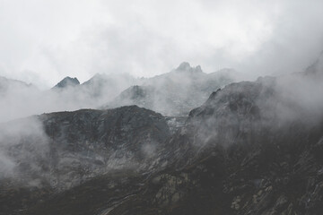 fog and grey clouds over the mountains