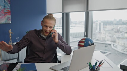 Aggressive businessman arguing phone office closeup. Man talking in raised tone