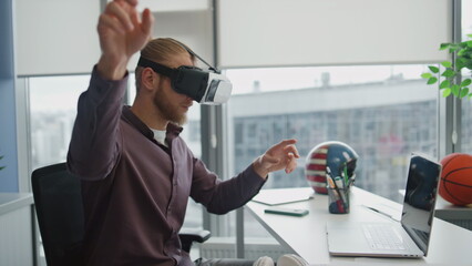 Vr man touching hands interactive world at workplace. Programmer testing 3d game