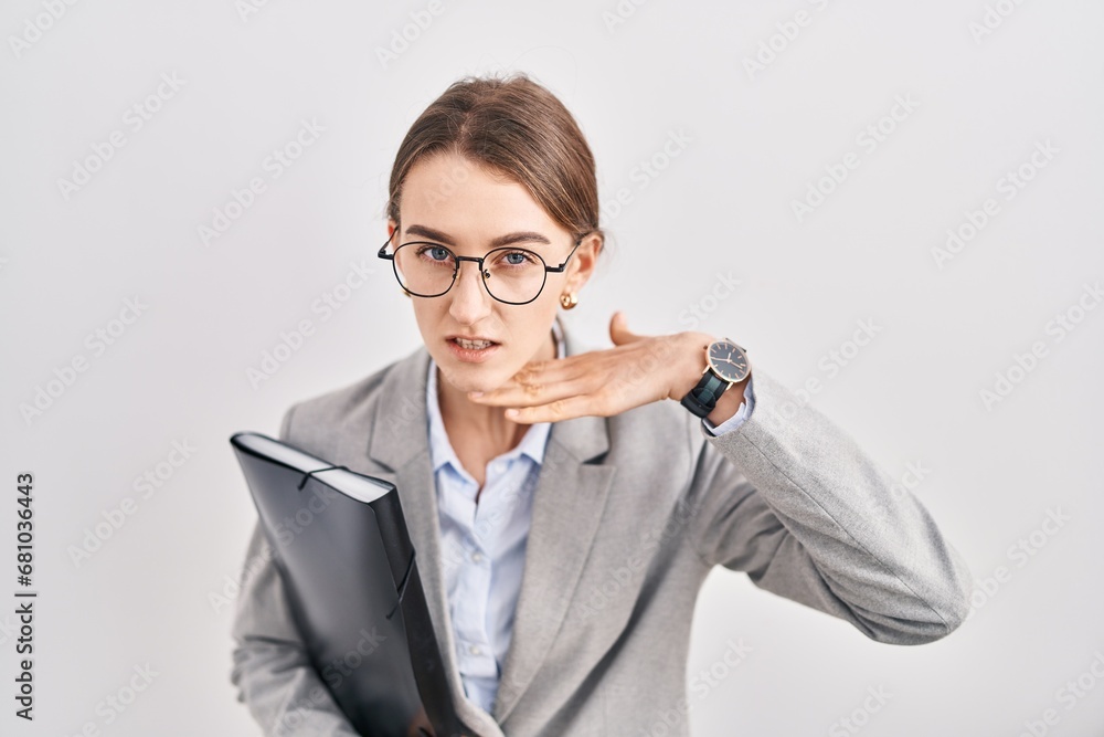 Poster Young caucasian woman wearing business clothes and glasses cutting throat with hand as knife, threaten aggression with furious violence