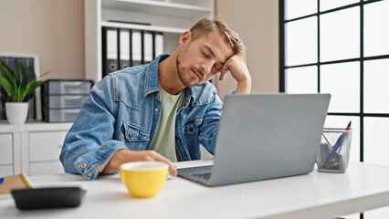 Young caucasian man business worker sleeping at office