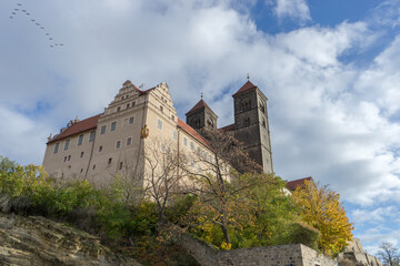 Fototapeta na wymiar Collegiate church of St. Servatii and castle in Quedlinburg on the hill