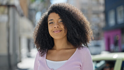 African american woman smiling confident standing at street