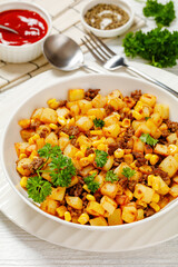 Beef Hash with roasted corn, garlic and parsley
