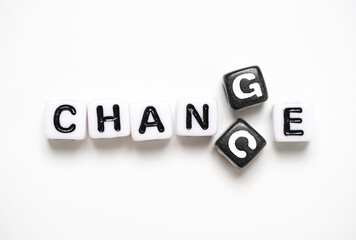 Change and chance on white and black cube, personal development to growth mindset concept.