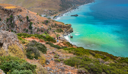 View famous beach with river and palm trees in Libyan sea. Crete, Greece