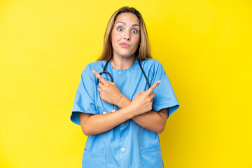 Young surgeon nurse woman isolated on yellow background pointing to the laterals having doubts