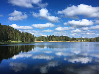 Forest lake with the reflected clouds near Elva, Tartumaa, May 2019