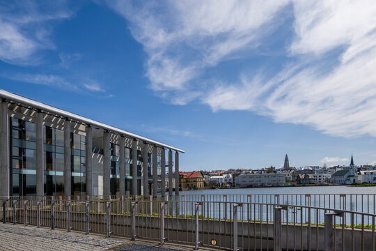 View from behind the reykjavik city hall over tjörnin lake to hallgrims kirkja and national gallery of iceland