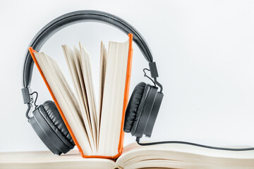 headphones on the book. place for text
