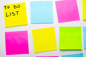 Adhesive sheets of different colors, with the wording 