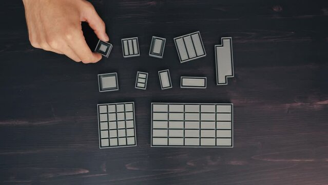 3D Printing Demonstration: Close-up of Hands Creating Plastic Parts, Top View