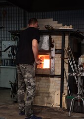 welder working in the  glass workshop