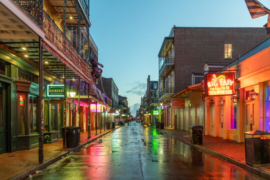 cleaning the Bourbon street in early morning after a party night in New Orleans