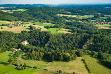 Fototapeta na wymiar The landscape of Franconian Switzerland - Germany seen from a small aircraft