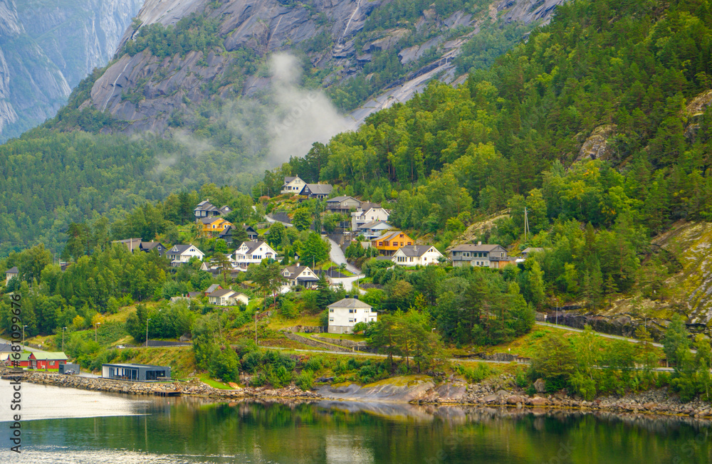 Wall mural curving road through eidfjord houses