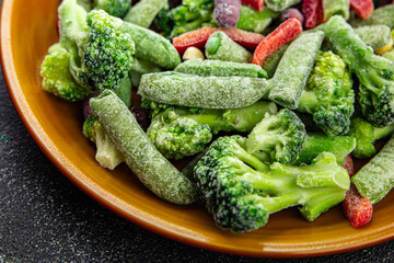 vegetable frozen mix broccoli, corn, carrot, green pea, green bean, bell pepper, bean fresh vegetables eating cooking appetizer meal food snack on the table copy space food background