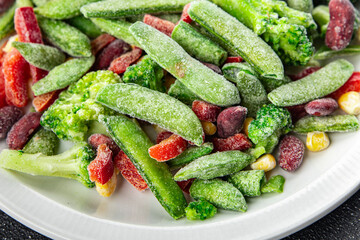 vegetable frozen mix broccoli, corn, carrot, green pea, green bean, bell pepper, bean fresh vegetables eating cooking appetizer meal food snack on the table copy space food background