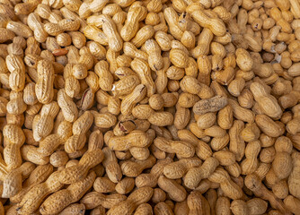 overview of large quantity of toasted peanuts