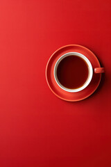 Obraz na płótnie Canvas minimalist red background with a Tea cup, cappuccino, coffee , top view with empty copy space