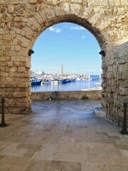 Access arch to the port of Monopoli, coastal town in Puglia, Italy