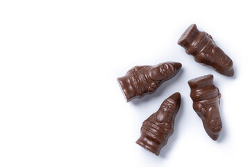 cheerful wrapped chocolate Santa Claus isolated on white background