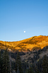 Moon rising over the mountains near Dubois, Wyoming at dusk