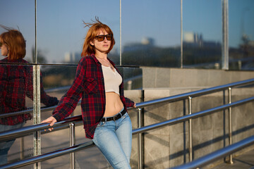 Stylish Redhead Woman in Urban Autumn Fashion - 681121223
