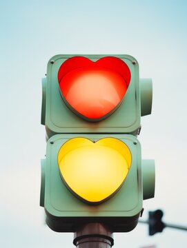 recommend clip art: Close-up of a traffic light with heart shaped lights