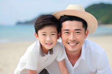 Fototapeta premium Portrait of father and child on the beach