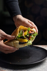 delicious pita with meat and cheese