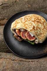 delicious pita with meat and cheese