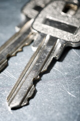 Keys on a scratched metal surface