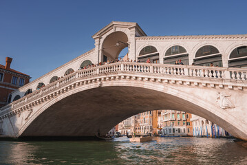 Fototapeta na wymiar Experience the timeless charm and beauty of Venice with a stunning view of the iconic Rialto Bridge. Capture the elegant arches and intricate design of this historical landmark.