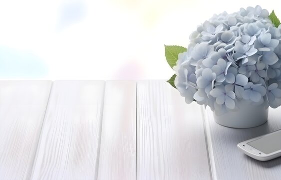 beautiful blue hydrangea flowers and phone on light wooden table for freelancing business card decor