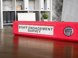 Folder with staff engagement survey.