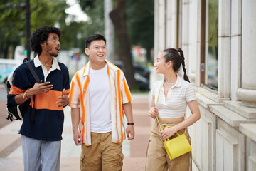 Black man showing city to his friends from another country