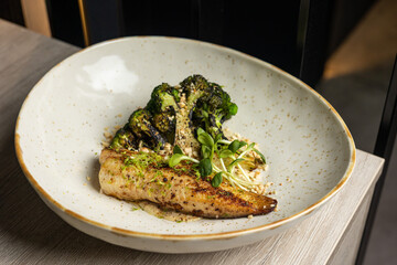 Baked sea bass with vegetables