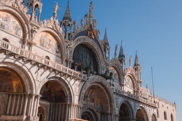 Beautiful Saint Marks Basilica building in Venice, Italy. Capture the essence of this stunning city with this captivating image. St. Marks Basilica - obrazy, fototapety, plakaty